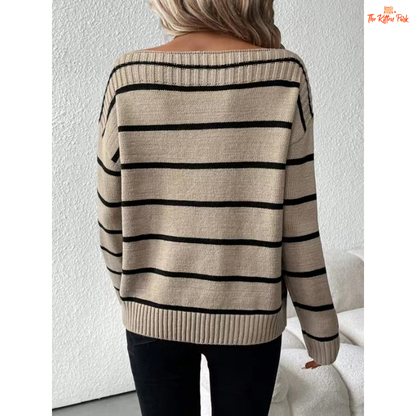 An elegant women’s off shoulder striped knit sweater with a slash neckline, full sleeves, and heavyweight acrylic fabric for autumn and winter wear.