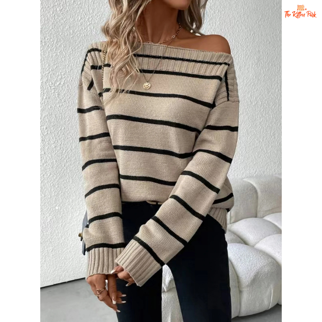An elegant women’s off shoulder striped knit sweater with a slash neckline, full sleeves, and heavyweight acrylic fabric for autumn and winter wear.