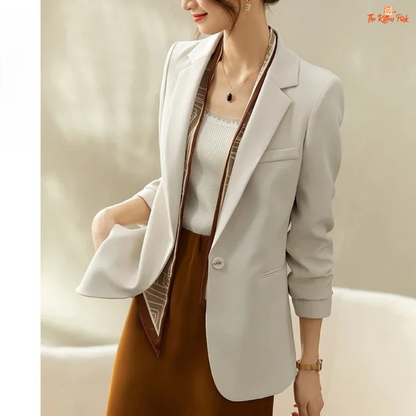 Elegant women’s office blazer with single-button closure, turn-down collar, pockets, and wide-waist fit in polyester-spandex for all-season wear.