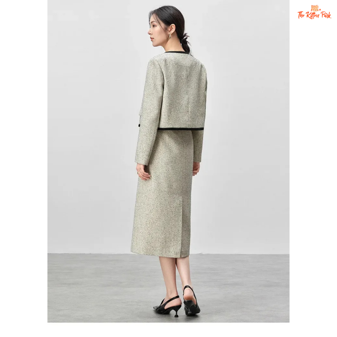Elegant women’s tweed two-piece skirt set in off-white with contrast trim, featuring a single-breasted jacket and mid-calf skirt for autumn and winter wear.