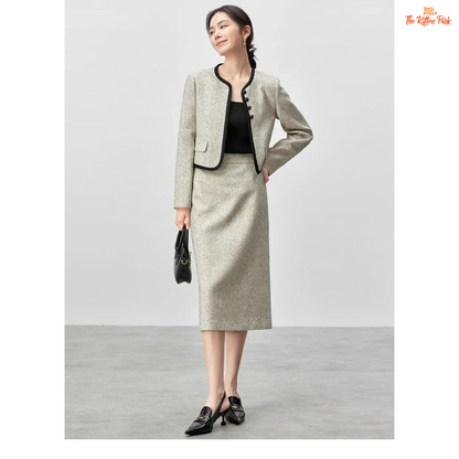 Elegant women’s tweed two-piece skirt set in off-white with contrast trim, featuring a single-breasted jacket and mid-calf skirt for autumn and winter wear.