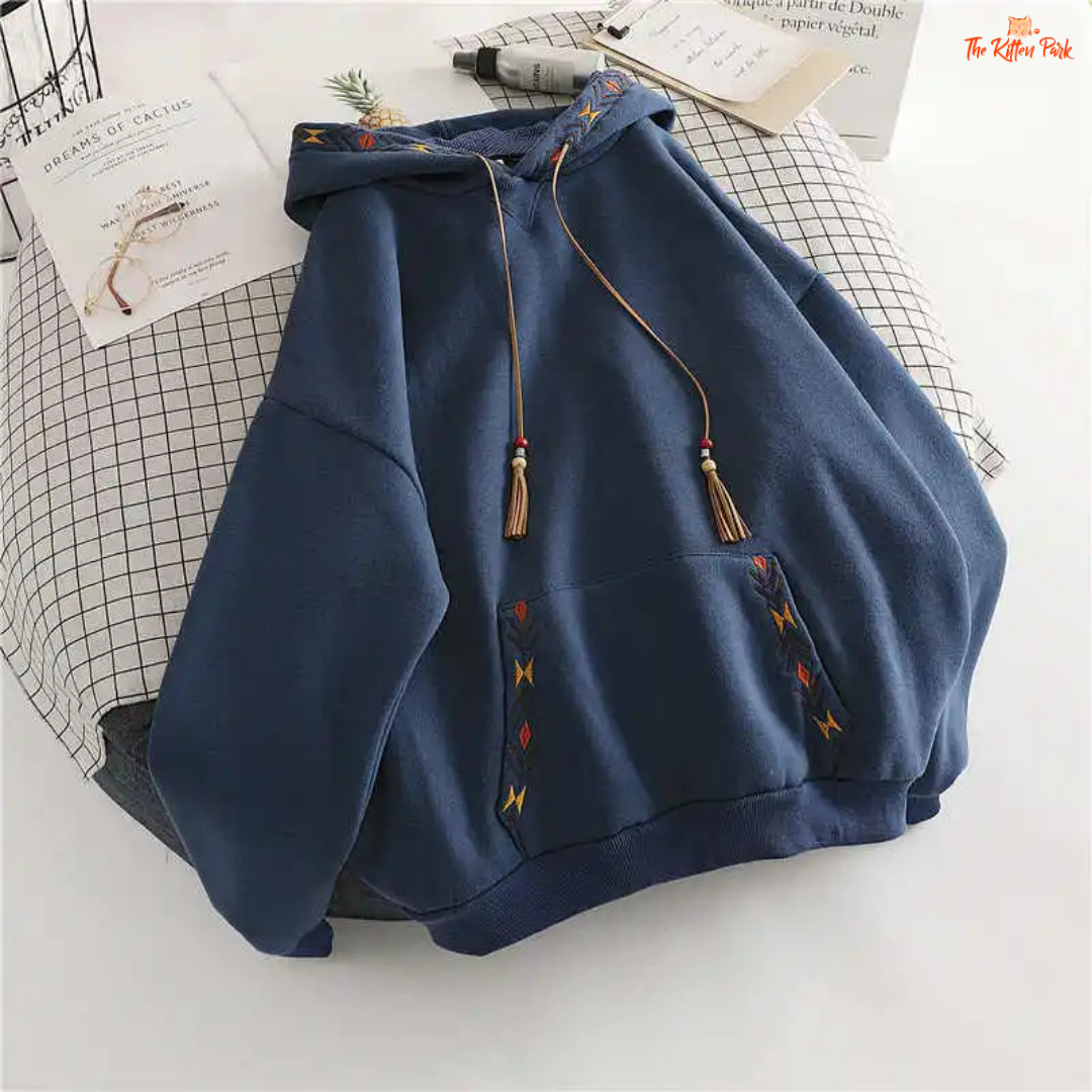 Embroidered Tassel Hoodie Women Large Pocket Pullover with floral embroidery, tassel details, hood, and a loose casual fit for autumn/winter streetwear.