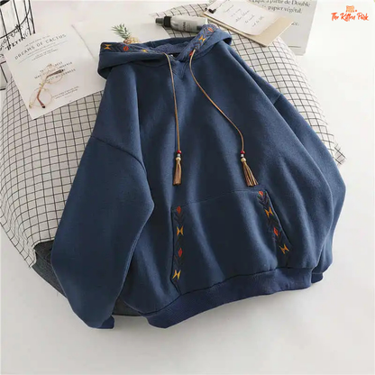 Embroidered Tassel Hoodie Women Large Pocket Pullover with floral embroidery, tassel details, hood, and a loose casual fit for autumn/winter streetwear.