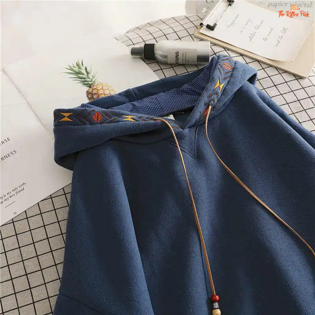 Embroidered Tassel Hoodie Women Large Pocket Pullover with floral embroidery, tassel details, hood, and a loose casual fit for autumn/winter streetwear.