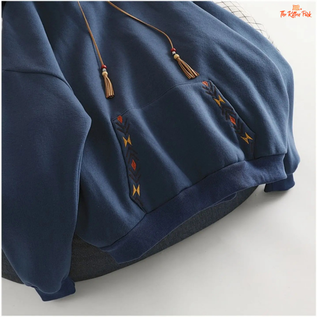 Embroidered Tassel Hoodie Women Large Pocket Pullover with floral embroidery, tassel details, hood, and a loose casual fit for autumn/winter streetwear.