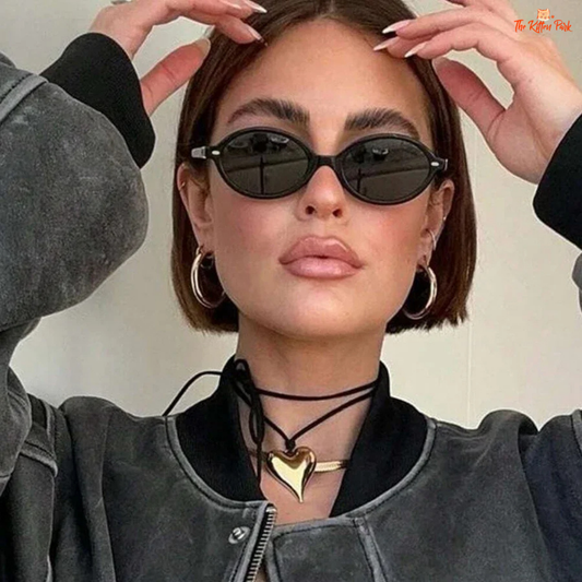 Retro-style small oval sunglasses with rivet detail and UV400 acrylic lenses for women, perfect for stylish and protective casual wear.