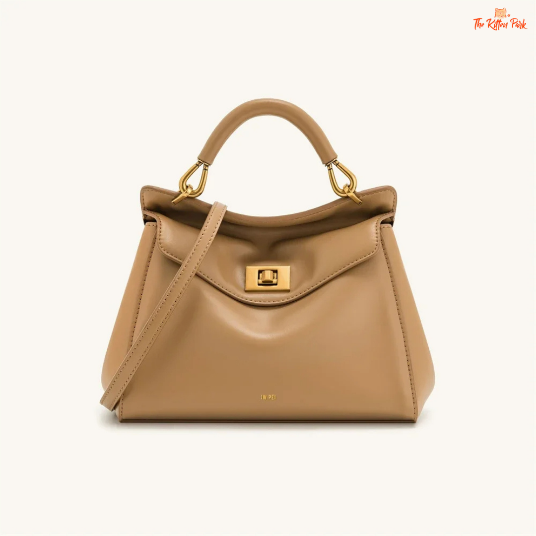 Stylish light luxury women's shoulder bag with lock closure, PU texture, baguette shape, and elegant gold chain accent in soft red and beige tones.