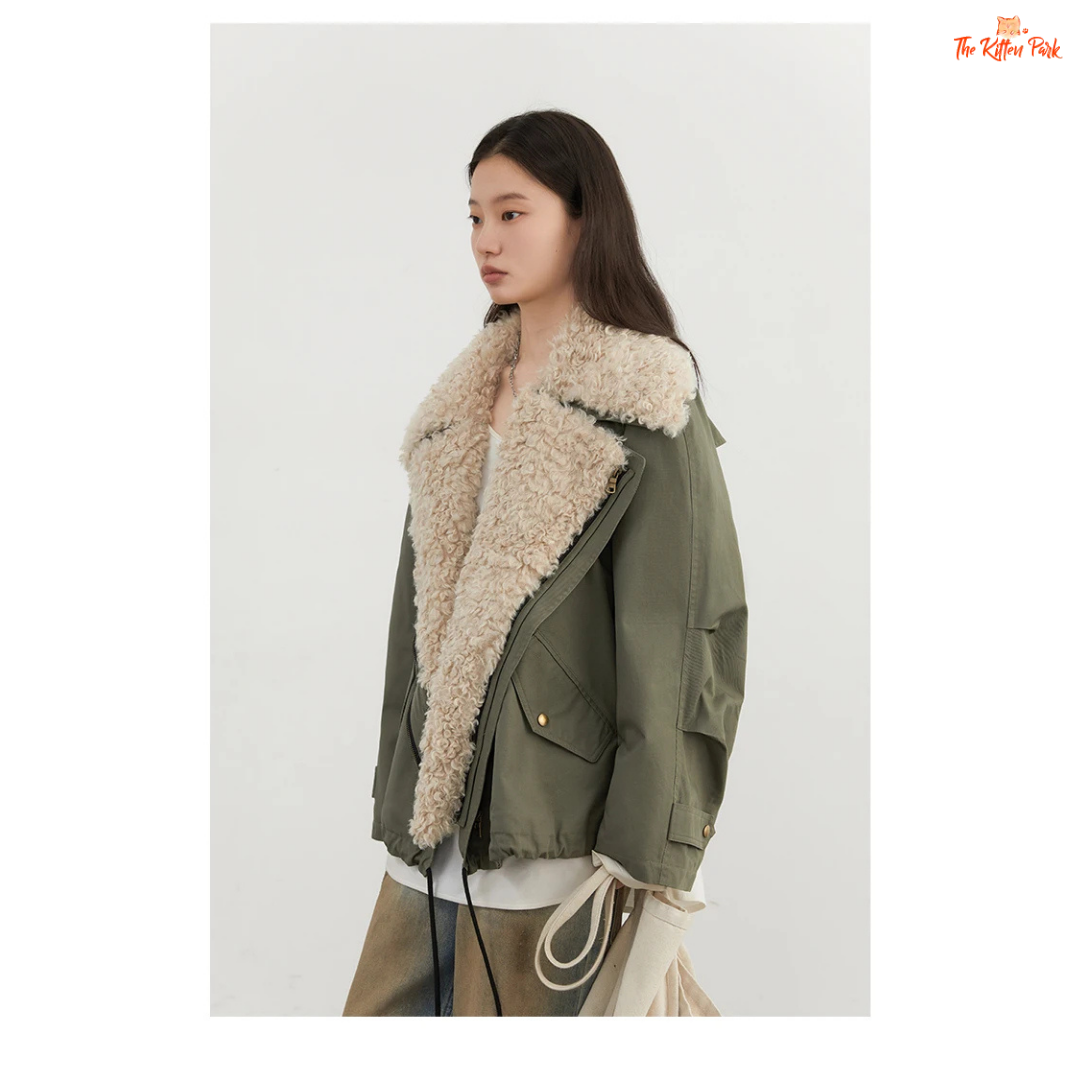 Warm thick cotton streetwear coat for women with turn-down collar, zipper closure, and pockets in a loose retro fit.