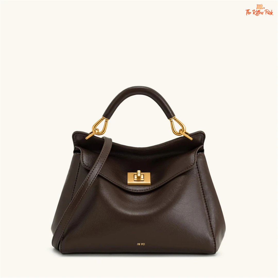 Stylish light luxury women's shoulder bag with lock closure, PU texture, baguette shape, and elegant gold chain accent in soft red and beige tones.