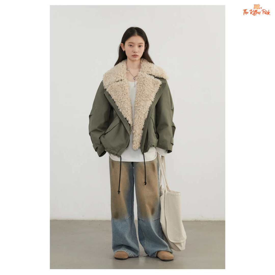 Warm thick cotton streetwear coat for women with turn-down collar, zipper closure, and pockets in a loose retro fit.