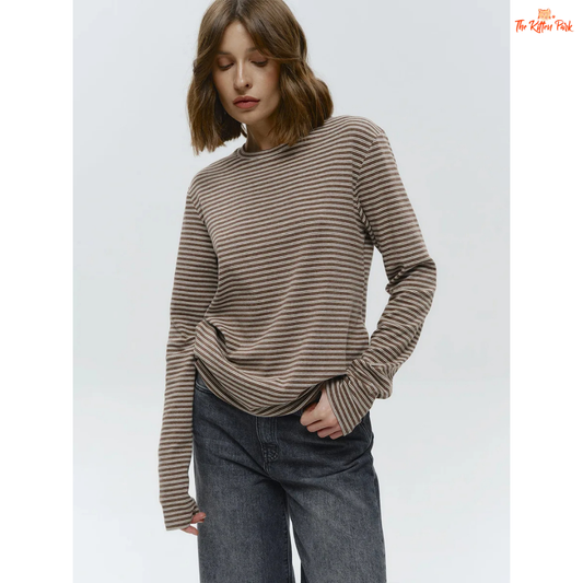 Women's striped long sleeve tee made of cotton and spandex, featuring a round neckline and regular fit — ideal for casual or office wear in cooler seasons.