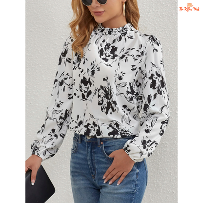 Elegant floral frill trim blouse with ruffled collar and lantern sleeves, made of lightweight chiffon in off-white tone.