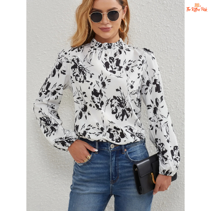 Elegant floral frill trim blouse with ruffled collar and lantern sleeves, made of lightweight chiffon in off-white tone.