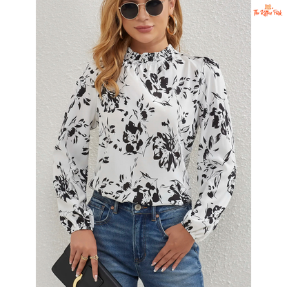 Elegant floral frill trim blouse with ruffled collar and lantern sleeves, made of lightweight chiffon in off-white tone.