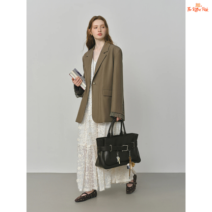 Elegant French-inspired women’s blazer with lace trim, notched collar, single-button closure, and solid design, made from lyocell and polyamide.