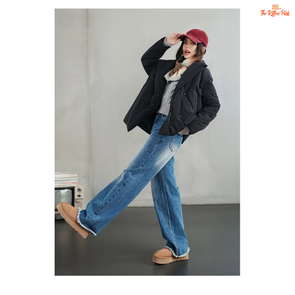 A black cotton-padded puffer coat for women with a collared design, thick warmth, covered button full opening, polyester fiber filling, and regular loose streetwear fit.