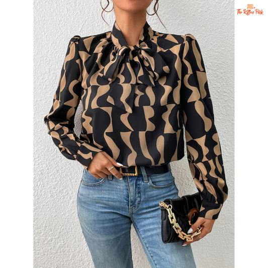 Women's patterned chiffon blouse with a round neckline, long sleeves, and a lightweight regular fit ideal for casual wear in all seasons.