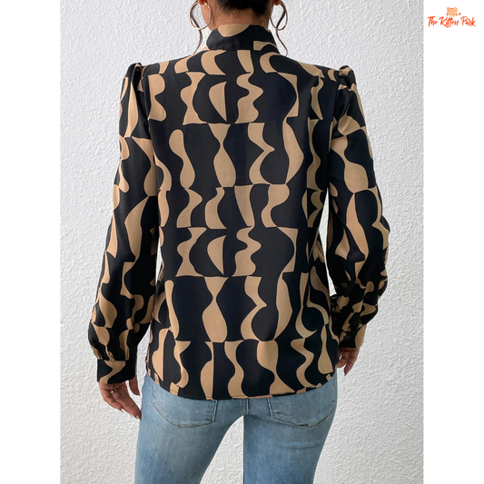 Women's patterned chiffon blouse with a round neckline, long sleeves, and a lightweight regular fit ideal for casual wear in all seasons.