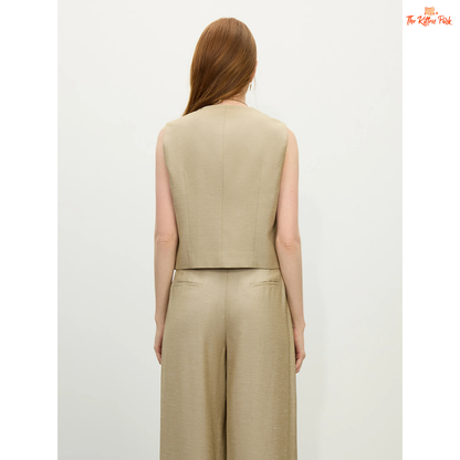 A women’s vintage linen two-piece set featuring a sleeveless tailored vest and wide-leg high-waist pants in a breathable beige summer style.