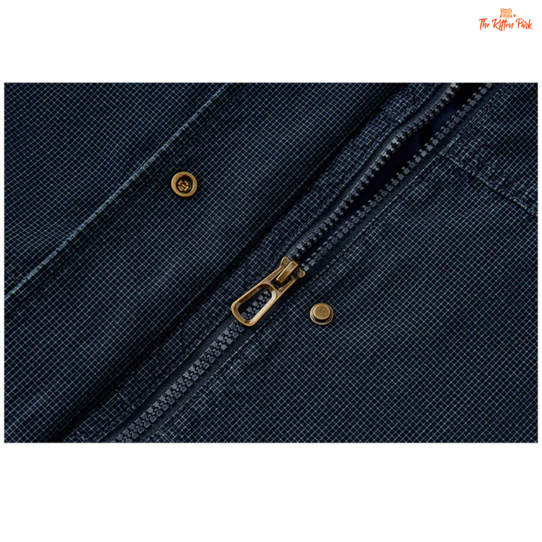 A women’s mid-length hooded denim jacket with loose fit, zipper full opening, waist-cinching detail, and cotton–polyester blend for spring and summer casual wear.