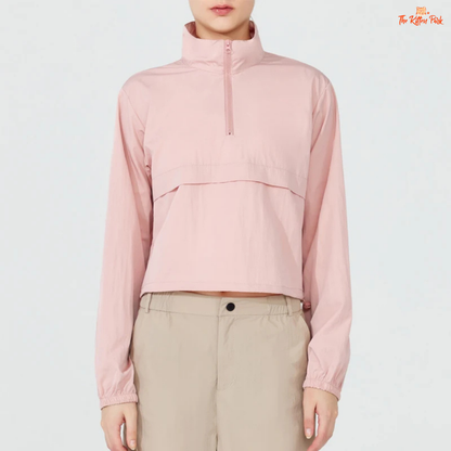 Women's lightweight quarter-zip windbreaker jacket with UPF50+ sun protection, breathable waterproof nylon, and cropped sporty design.