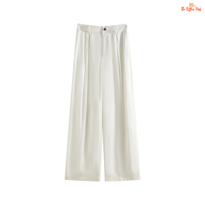 White wide-leg pants on a white background with 'The Ruffle Patch' logo.