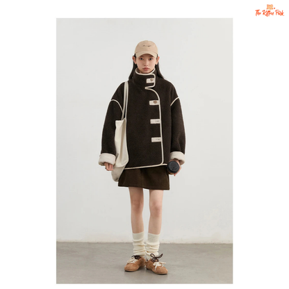 Reversible faux lamb fur jacket for women with patchwork design, turtleneck collar, and single-breasted closure for warm winter streetwear style.