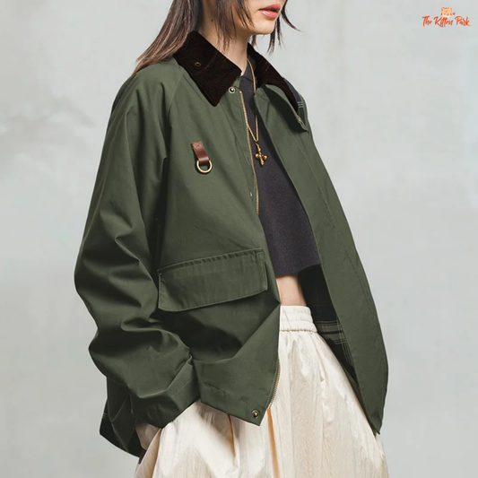 Vintage green corduroy jacket with lapel collar, patchwork design, zipper front, and safari-style pockets for autumn and winter wear.