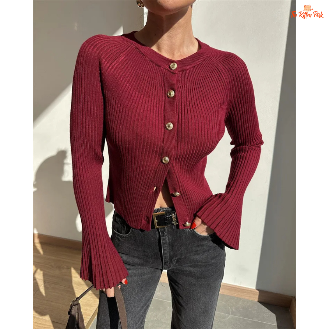 A women’s ribbed knit slim-fit cardigan with long sleeves, flare cuffs, and button closure, styled for chic high-street fashion.