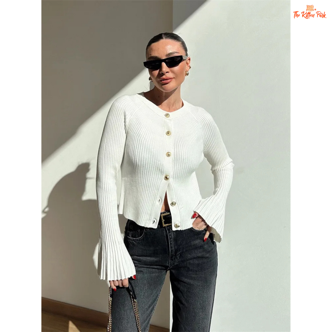 A women’s ribbed knit slim-fit cardigan with long sleeves, flare cuffs, and button closure, styled for chic high-street fashion.