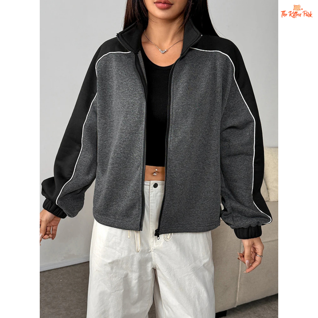A women’s thick knitted zipper coat featuring a patchwork design, turn-down collar, and full front zipper