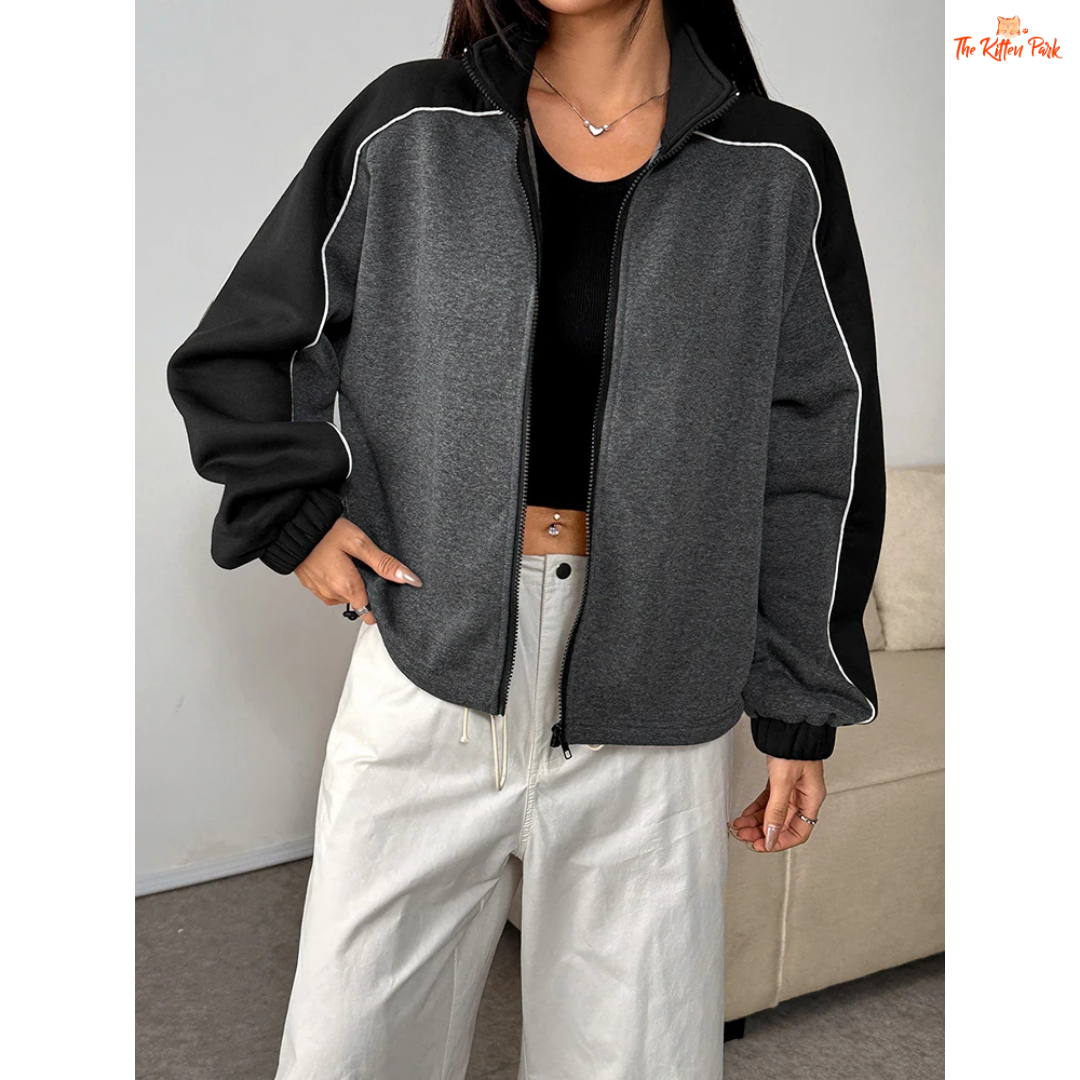 A women’s thick knitted zipper coat featuring a patchwork design, turn-down collar, and full front zipper