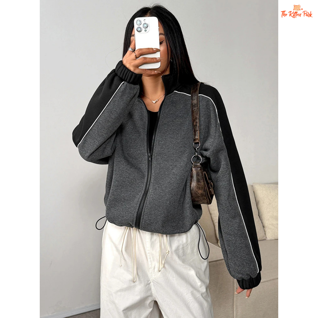 A women’s thick knitted zipper coat featuring a patchwork design, turn-down collar, and full front zipper