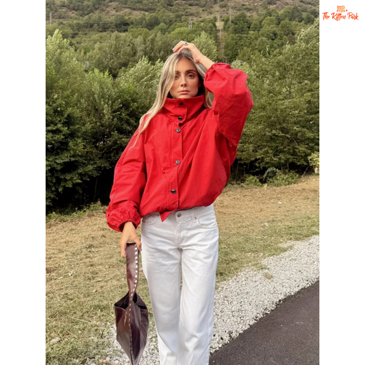 A women’s red short cotton jacket with stand collar, single-breasted closure, and pockets, designed in a slim retro streetwear style.