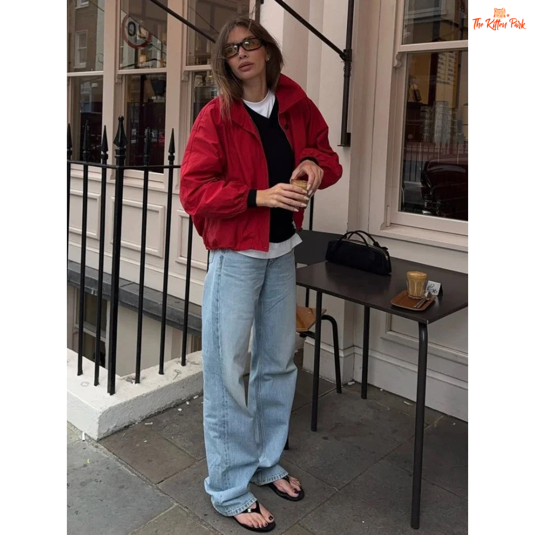 A women’s red short cotton jacket with stand collar, single-breasted closure, and pockets, designed in a slim retro streetwear style.