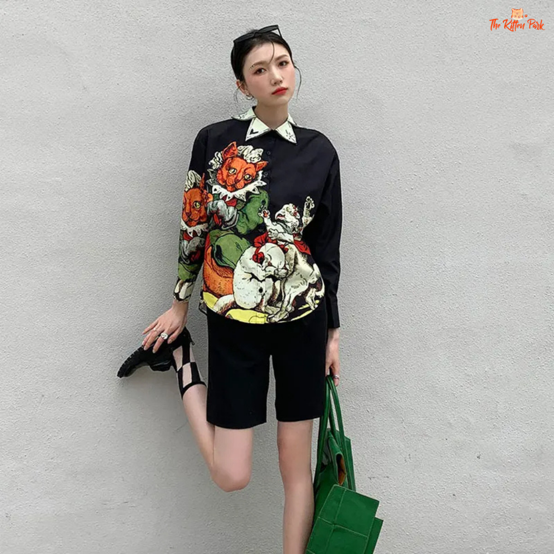 Black aesthetic print shirt for women with a collared button-up design, long sleeves, and sleek silhouette—styled for autumn and winter streetwear.