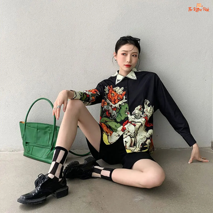 Black aesthetic print shirt for women with a collared button-up design, long sleeves, and sleek silhouette—styled for autumn and winter streetwear.