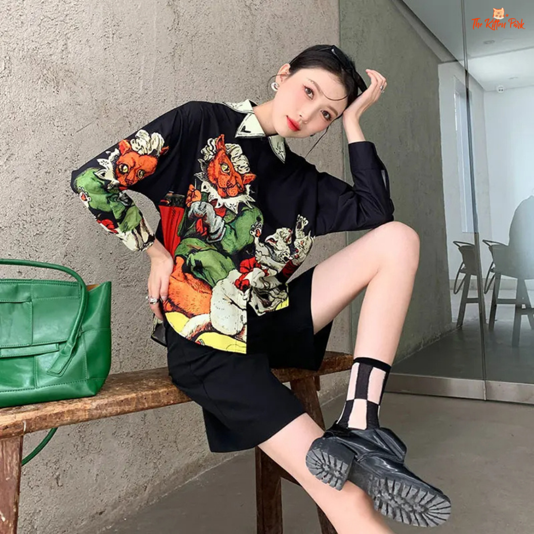 Black aesthetic print shirt for women with a collared button-up design, long sleeves, and sleek silhouette—styled for autumn and winter streetwear.