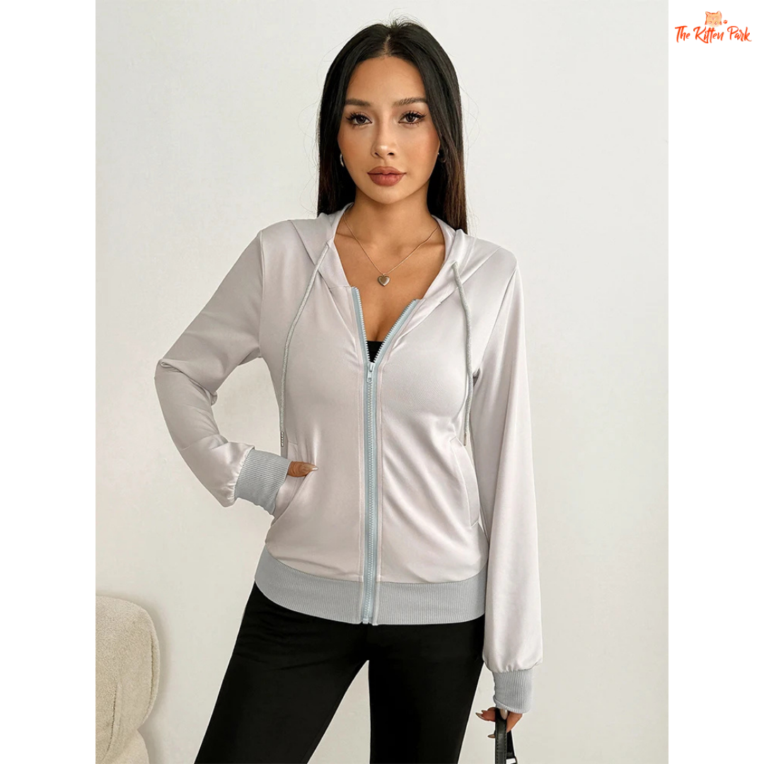 Cream-colored lace-up hooded zipper top for women with thick knit fabric and sporty pullover design, perfect for autumn outfits.