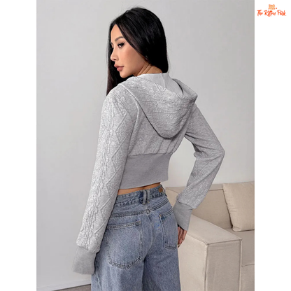 A women’s cropped lace-up zipper hoodie featuring a pullover design, soft knitted fabric, and hood