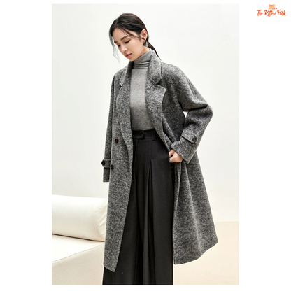 Women’s long woolen winter coat with double-breasted design, turn-down collar, button details, and thick wool blend.