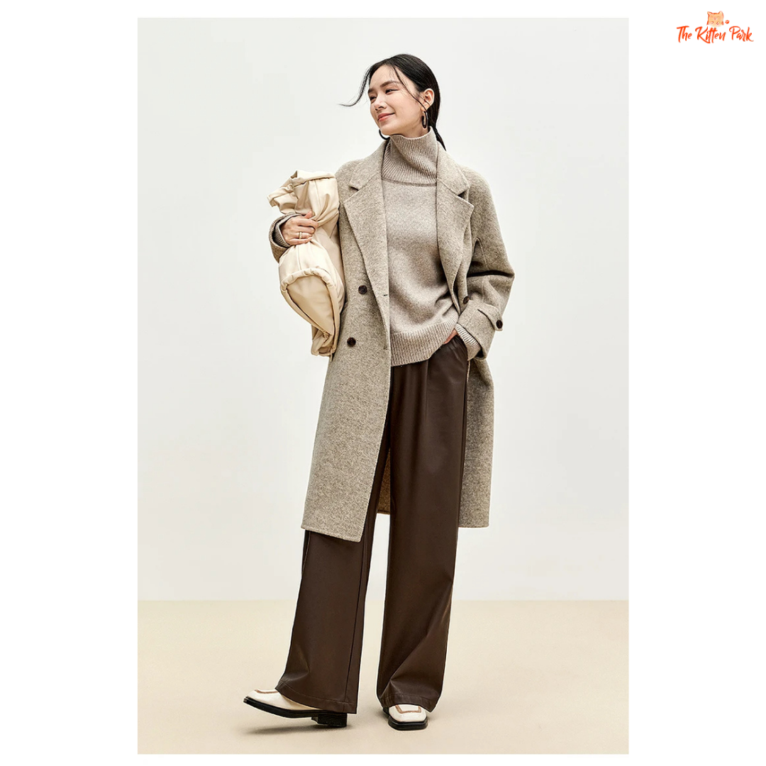 Women’s long woolen winter coat with double-breasted design, turn-down collar, button details, and thick wool blend.