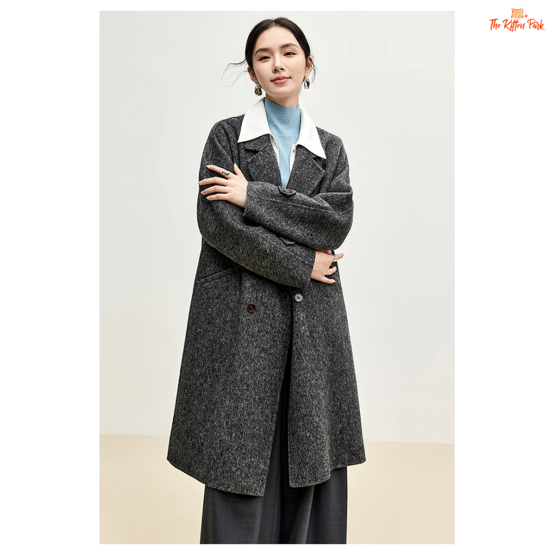 Women’s long woolen winter coat with double-breasted design, turn-down collar, button details, and thick wool blend.