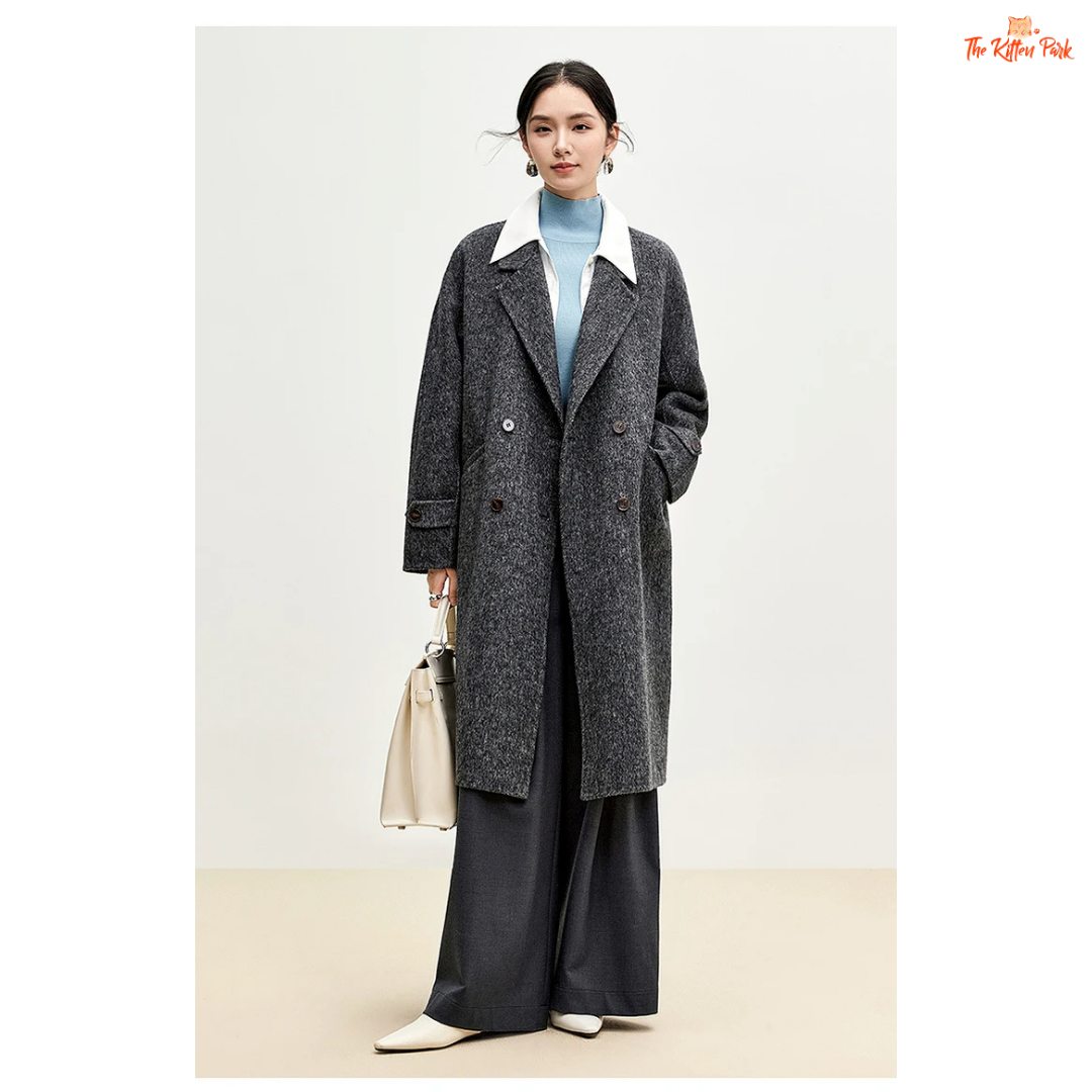 Women’s long woolen winter coat with double-breasted design, turn-down collar, button details, and thick wool blend.