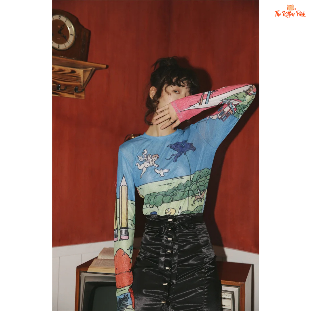 Women's slim-fit sheer mesh top with long sleeves and artistic hand-painted design, ideal for stylish layering in all-season streetwear.