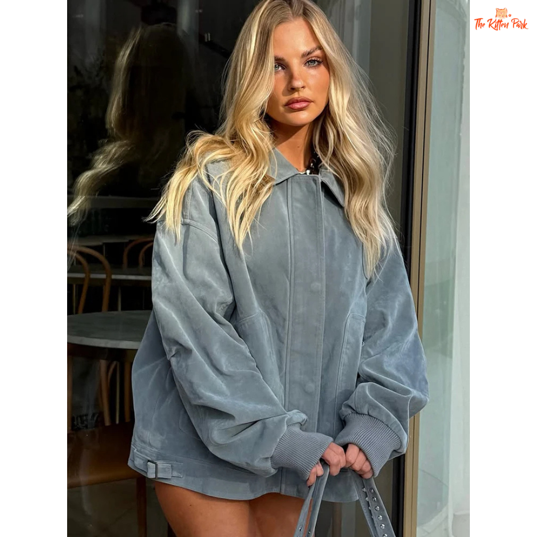 Vintage blue suede jacket with lantern sleeves, turn-down collar, and single-breasted front, designed for casual autumn/winter wear.