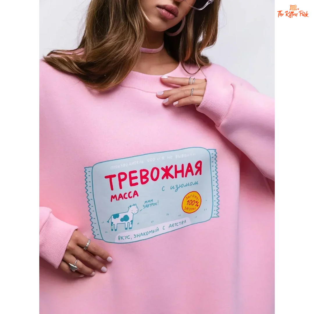 A women’s oversized cotton-polyester sweatshirt with round neck, drop-shoulder sleeves, pullover style, and printed design for autumn/winter wear.