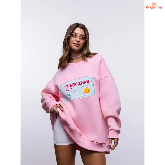 A women’s oversized cotton-polyester sweatshirt with round neck, drop-shoulder sleeves, pullover style, and printed design for autumn/winter wear.