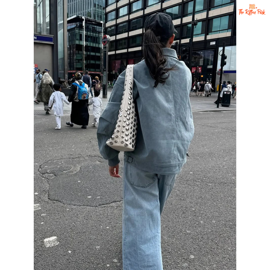 Vintage blue suede jacket with lantern sleeves, turn-down collar, and single-breasted front, designed for casual autumn/winter wear.