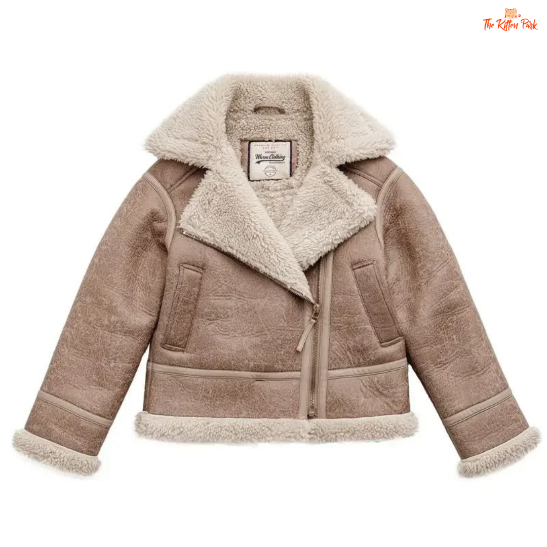 Apricot faux lamb fur leather jacket for women with thick warm lining, turn-down collar, zipper closure, and biker style for autumn and winter.